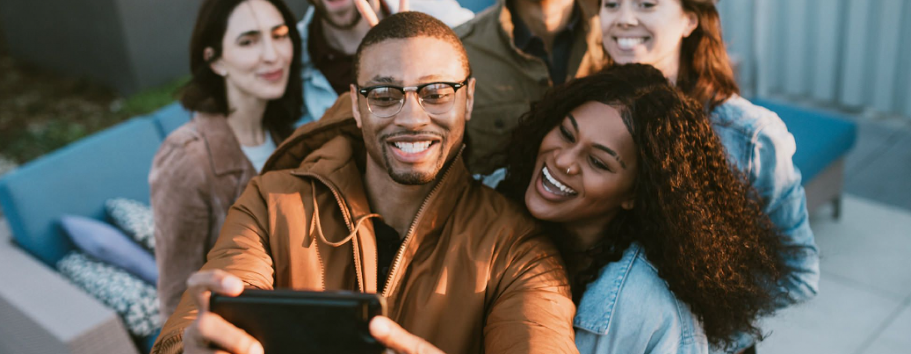 You belong here people gathered taking a photo